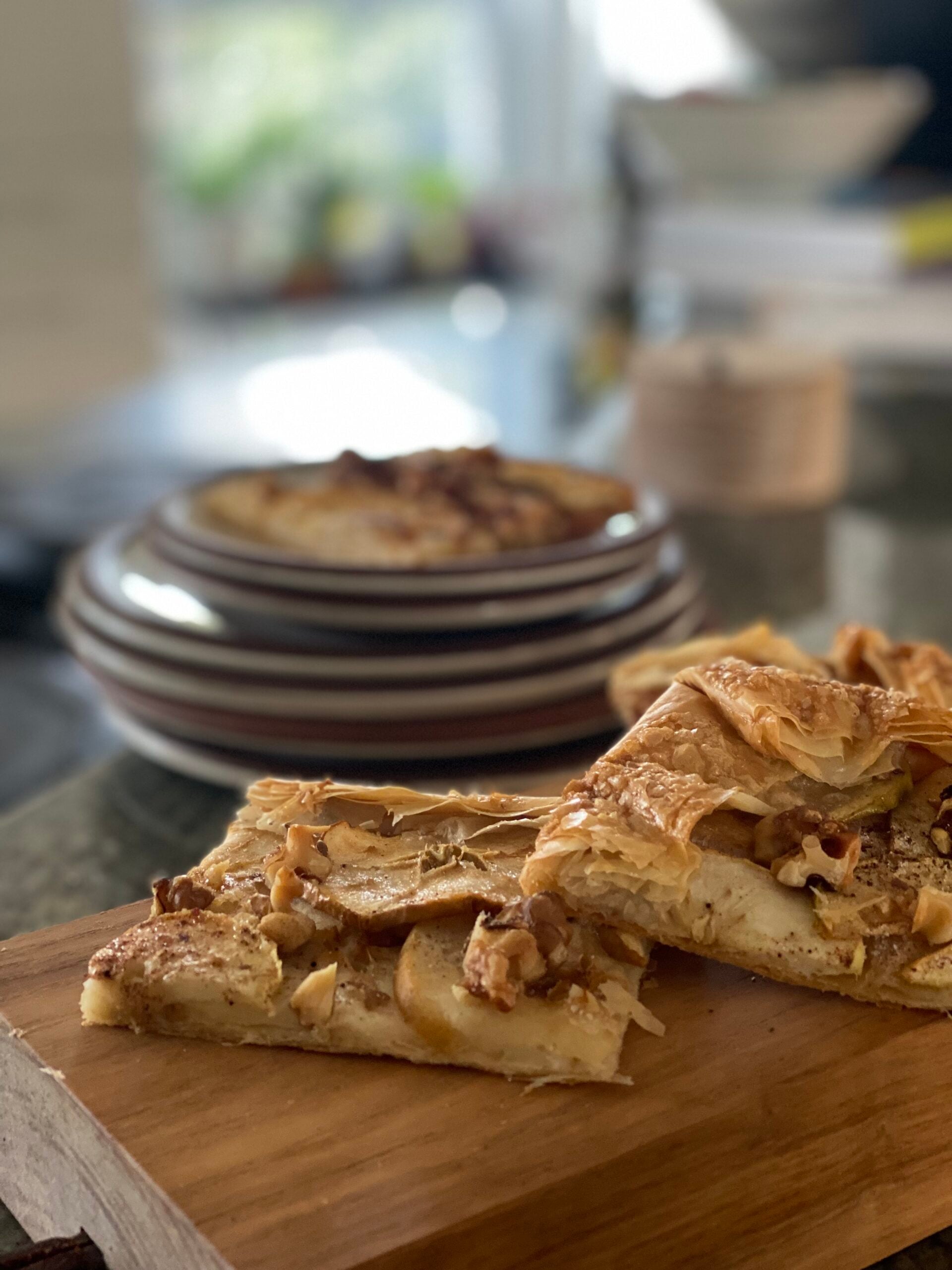 slices of apple tart laid out for serving.