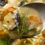 fish stew toppings on a spoon