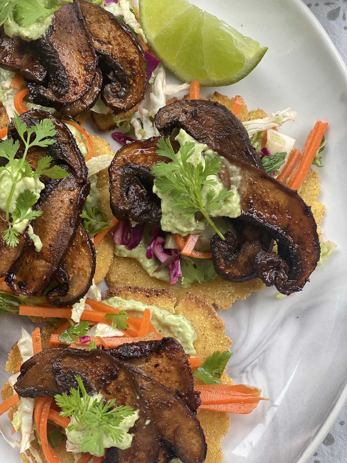 overhead close up shot of 4-6 mini tostadas on a serving plate.