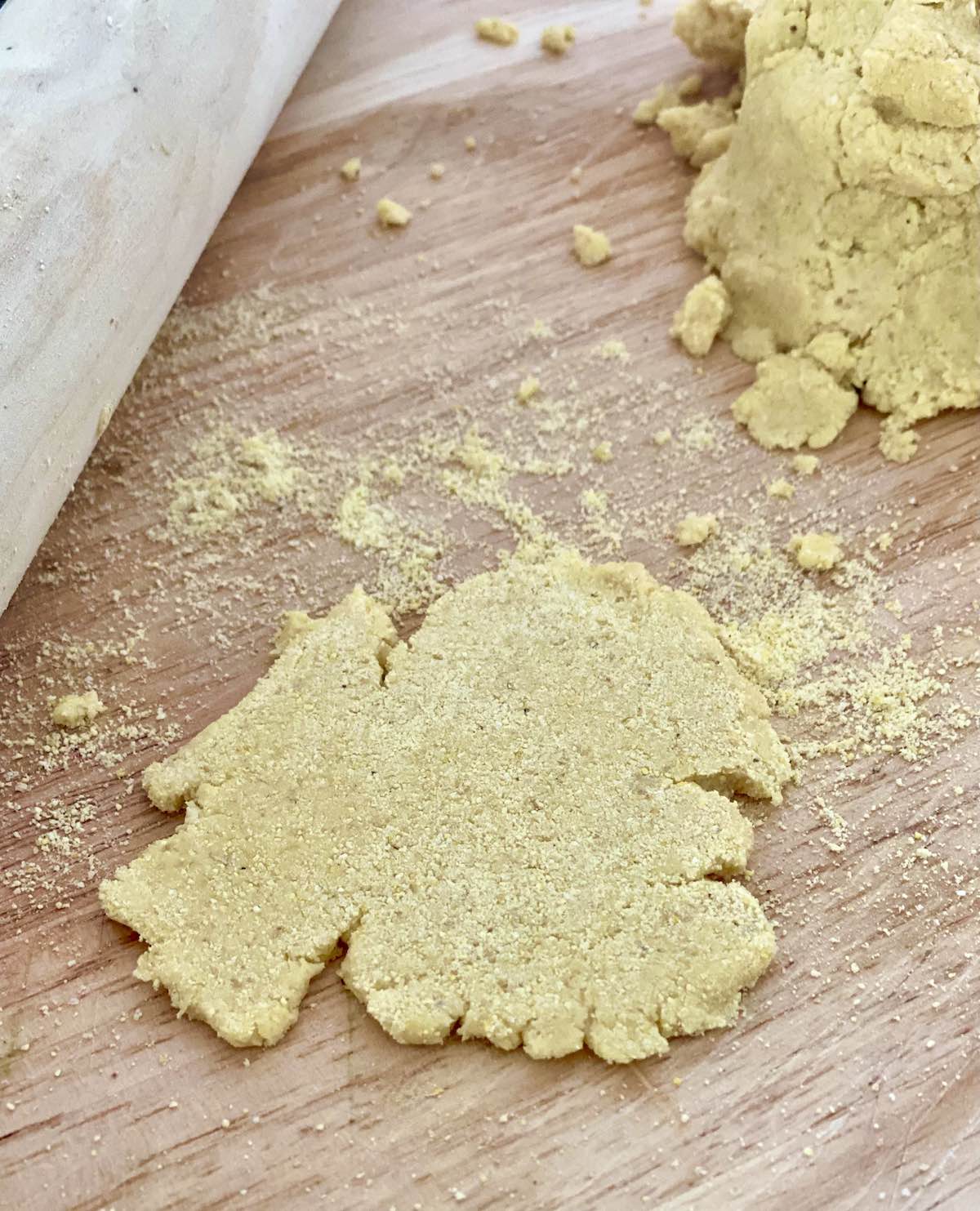 rolling out mini tortillas.