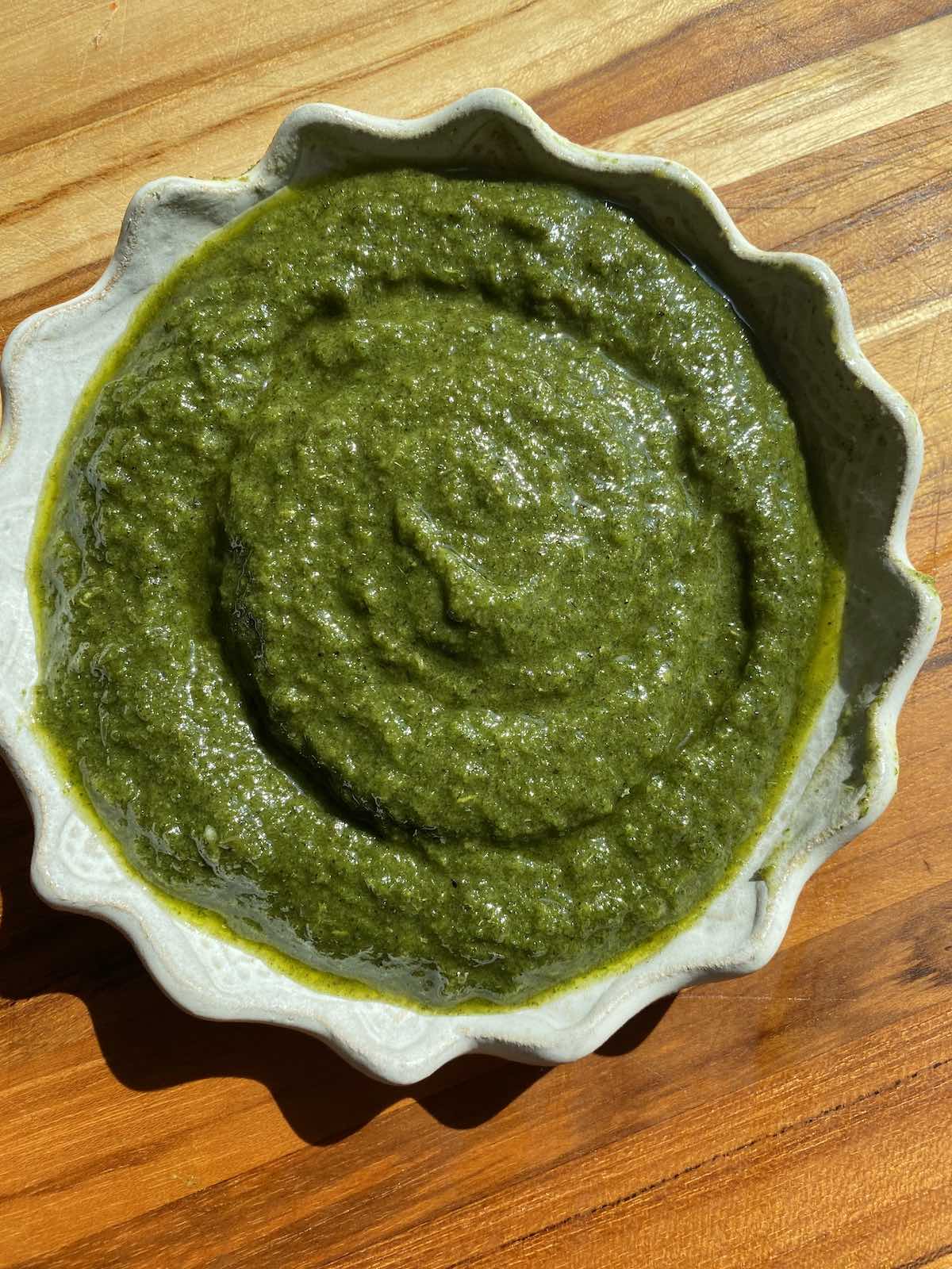finished miso herb pesto, sitting in small dish, ready to be used.