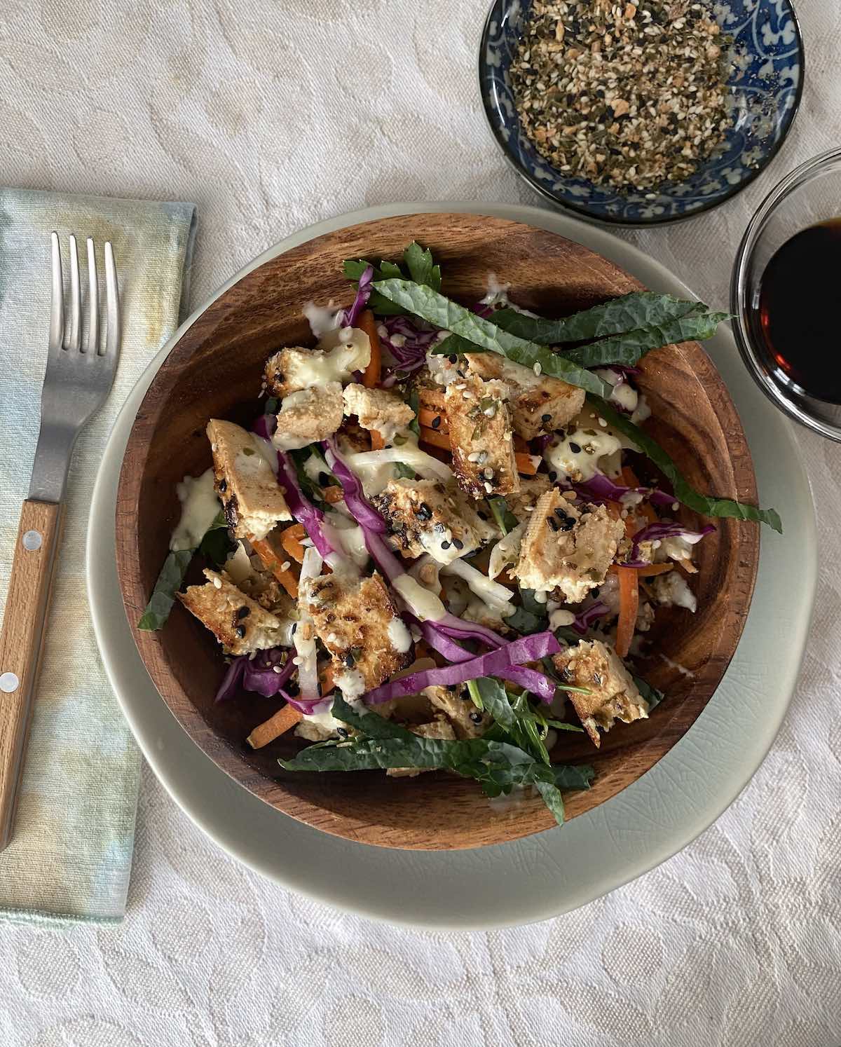 tofu marinated sushi style, then in a bowl with other sushi wrap ingredients, ready to eat.